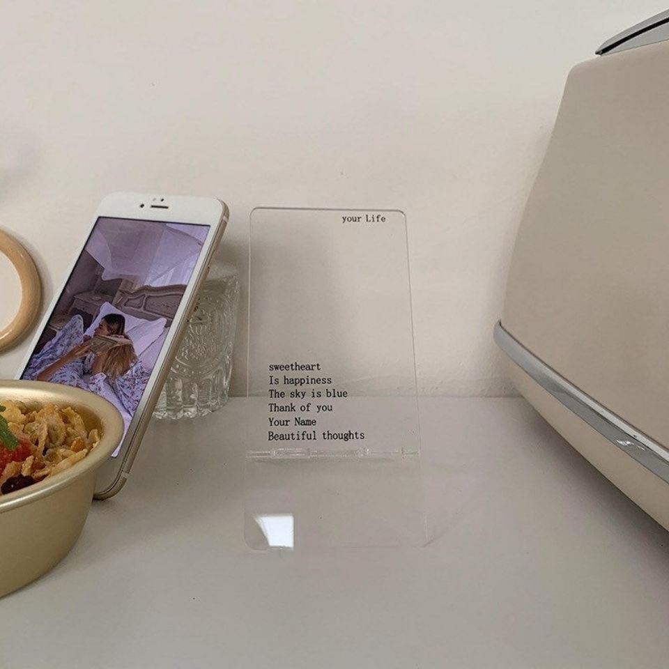 Giá Đỡ Điện Thoại Bằng Acrylic Trong Suốt In Chữ Cái Tiếng Anh Để Bàn Tiện Dụng