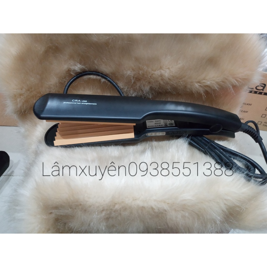 Máy bấm tóc CRA -203bấm tóc xù đẹp,mềm bóng đẹp với chất liệu thép titan giúp Máy bấm êm, nhanh, không rít tóc