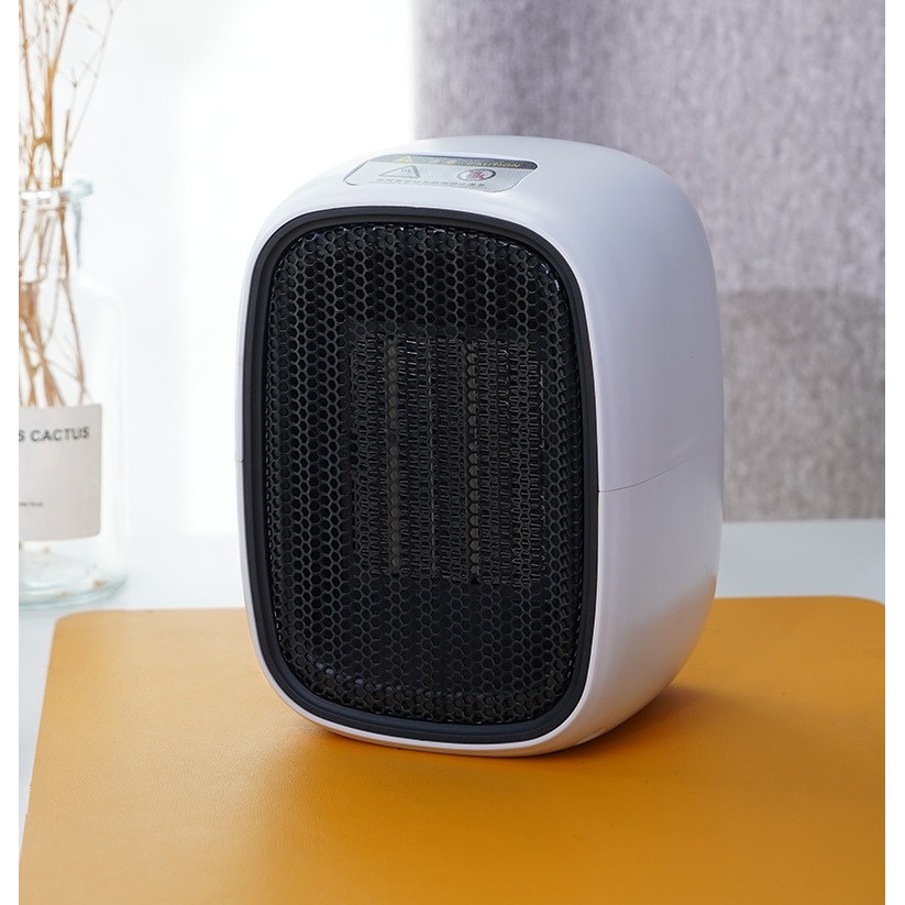 Máy Sưởi Ấm Mini Xách Tay Hoặc Để Bàn Đa Năng Công Suất 500W Dùng Cho Gia Đình Hoặc Văn Phòng Nhỏ