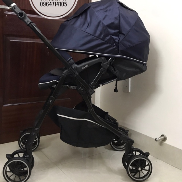 Xe đẩy em bé Combi Handy 4cas thanh lý