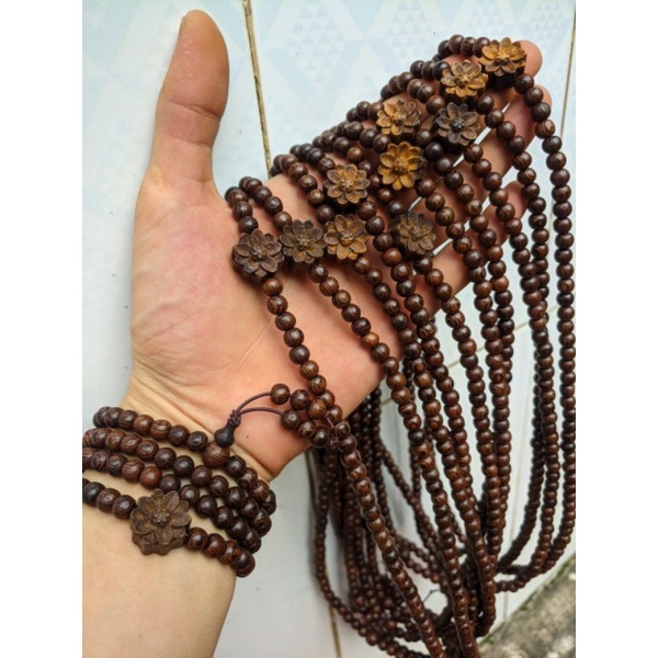 Vòng tay nữ 6 ly  chuỗi tràng hạt 108 gỗ vân mun đuôi công mix Charm hoa sen