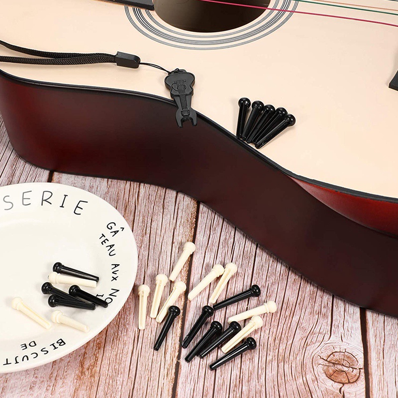 Bộ 36 Chốt Ngựa Đàn guitar Màu Trắng Và Đen Kèm 1 Dụng Cụ Tháo Gỡ