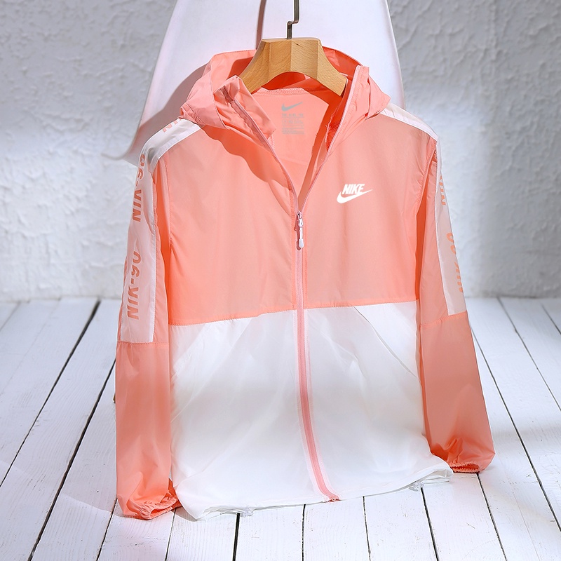 Áo khoác thể thao Nike mỏng có nón trùm bằng vải khô nhanh cho nữ