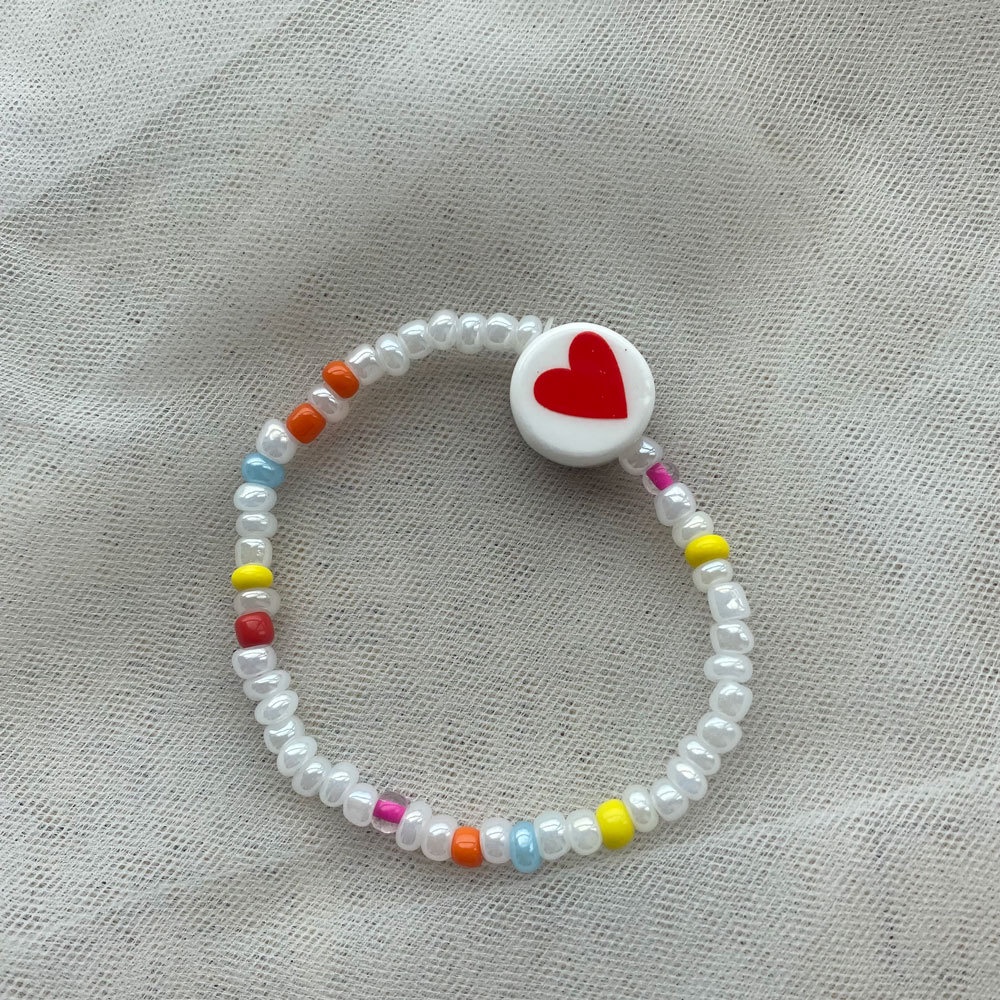 Vòng Tay Hạt Sứ Trắng Hình Mặt Cười Nhiều Màu Xinh Xắn