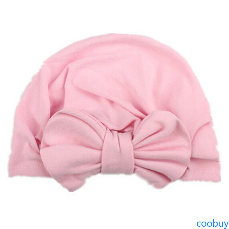 Mũ trùm đầu đính nơ đáng yêu cho bé