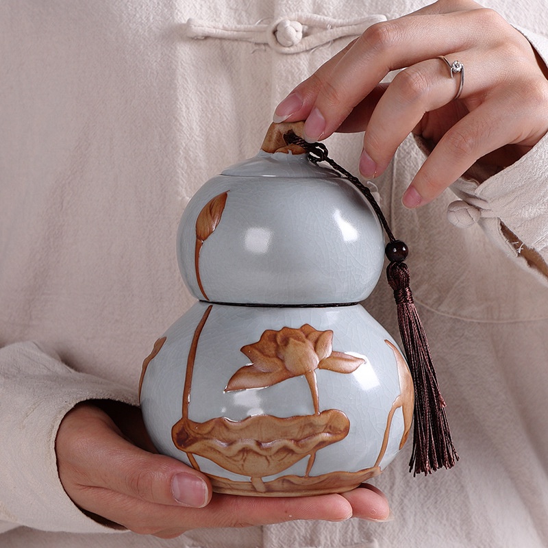 Hũ, Bình Đựng trà họa tiết hoa sen đắp nổi