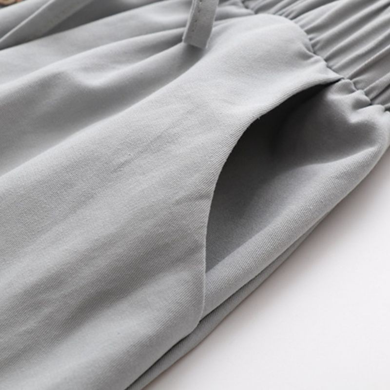 _ Chân váy đũi Hàn đính nơ phối cúc nhiều màu