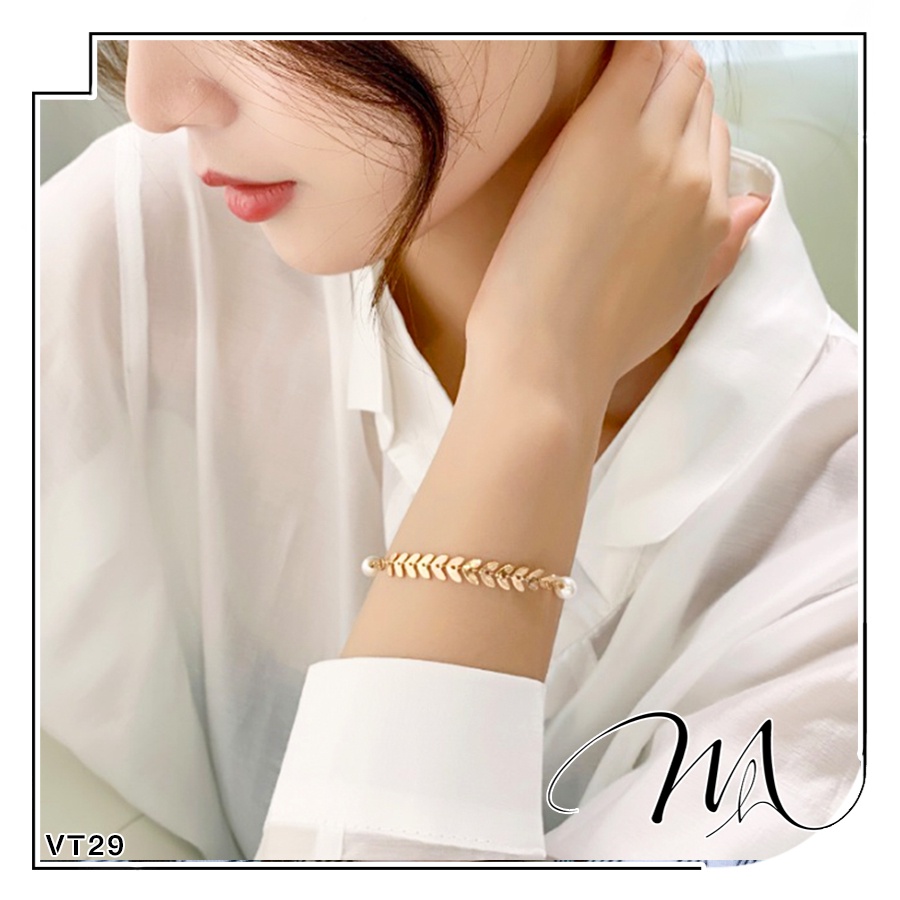 Lắc tay nữ Titan hình lá nguyệt quế ngọc trai nhân tạo Titan không gỉ - Măng's House VT29