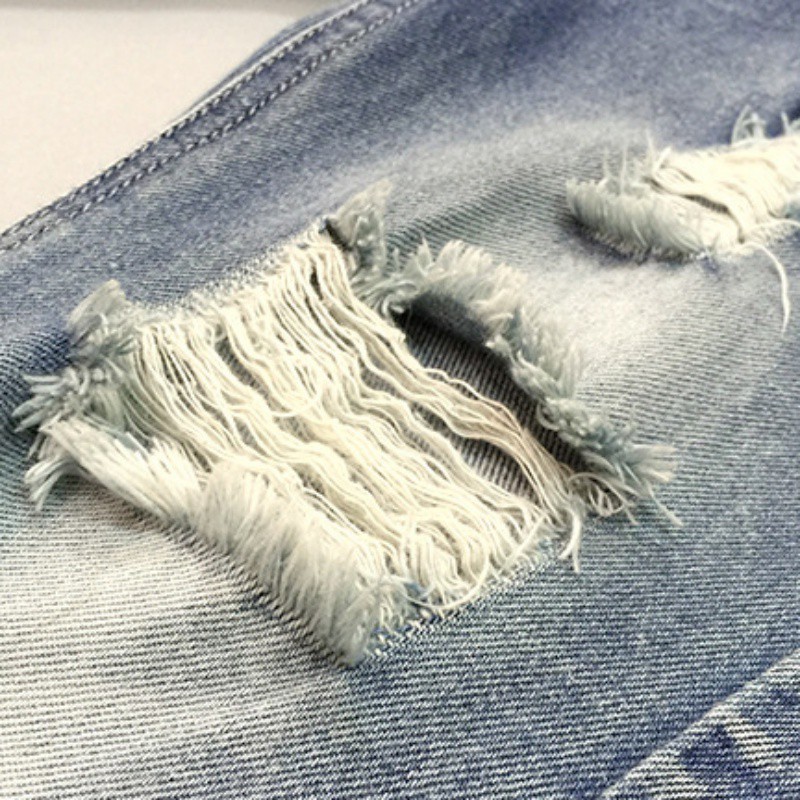 Quần jeans dáng dài rách sành điệu cho bé