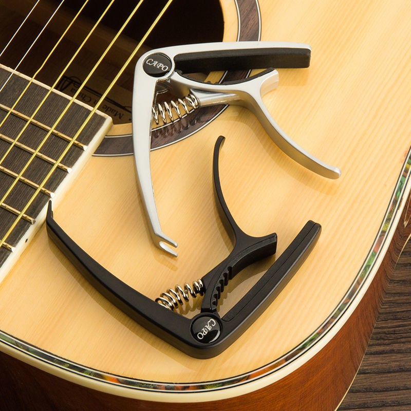 Kẹp Capo Một Cách Sử Dụng Cho Đàn Guitar Acoustic