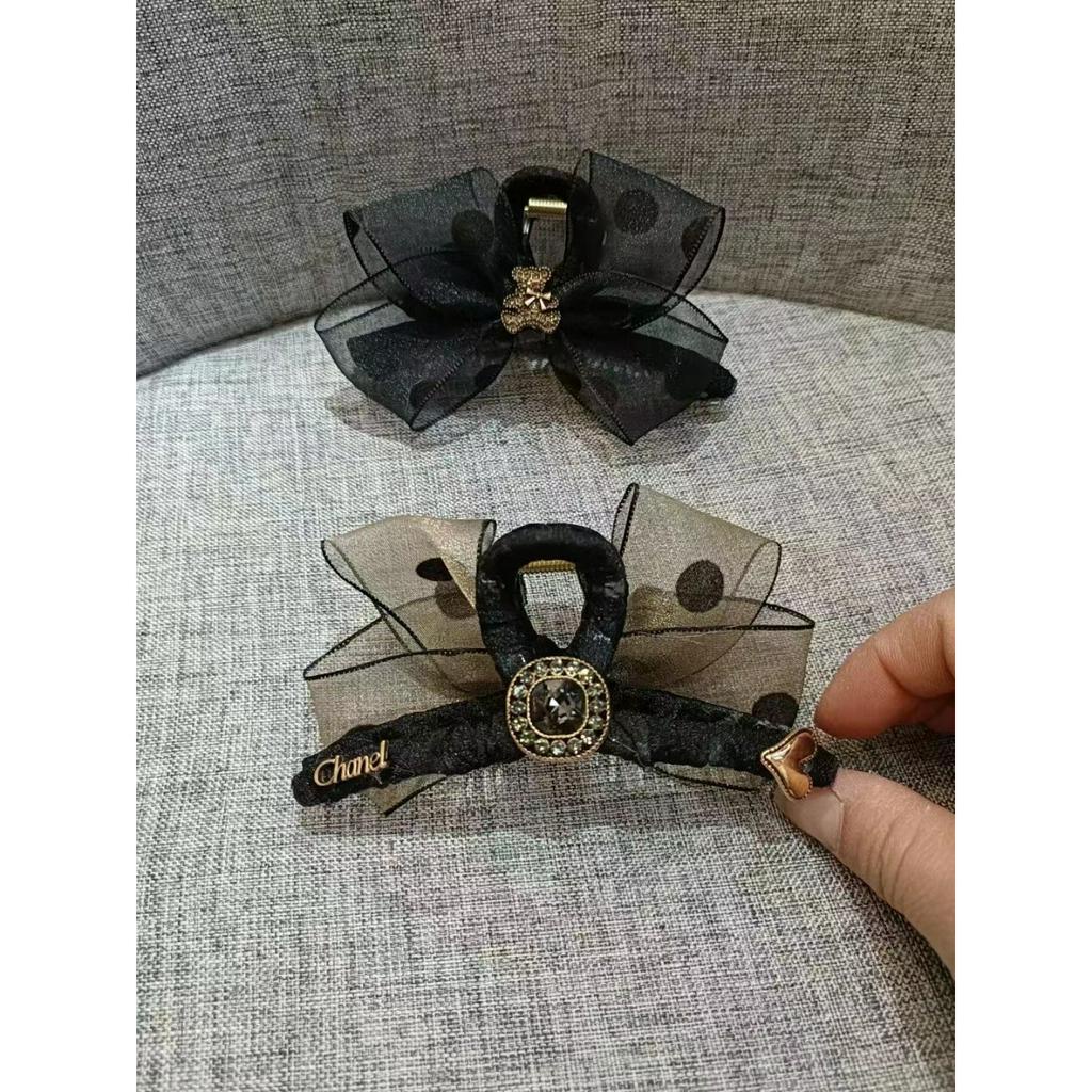 Kẹp càng cua nơ voan chấm bi gắn charm