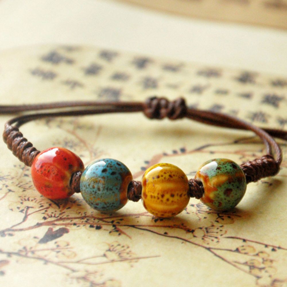 Vòng tay mặt hình chiếc lá , trái tim , chất liệu sứ