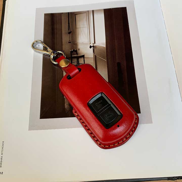 Vỏ bao chìa khóa xe máy Lead - da bò thật - màu đỏ - sản phẩm thủ công DT409
