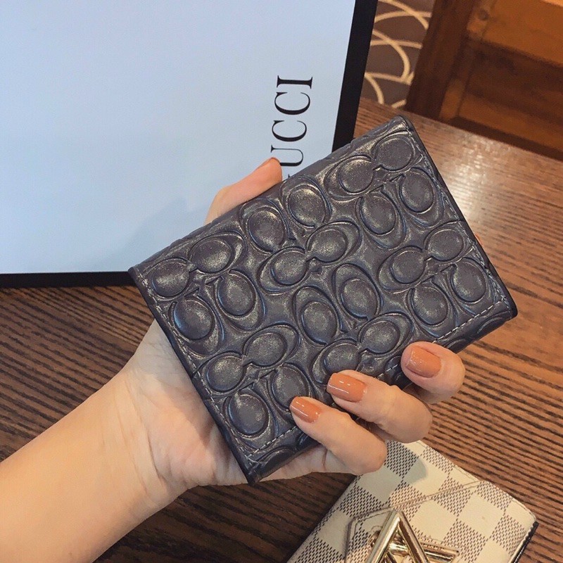 ví COACH cầm tay