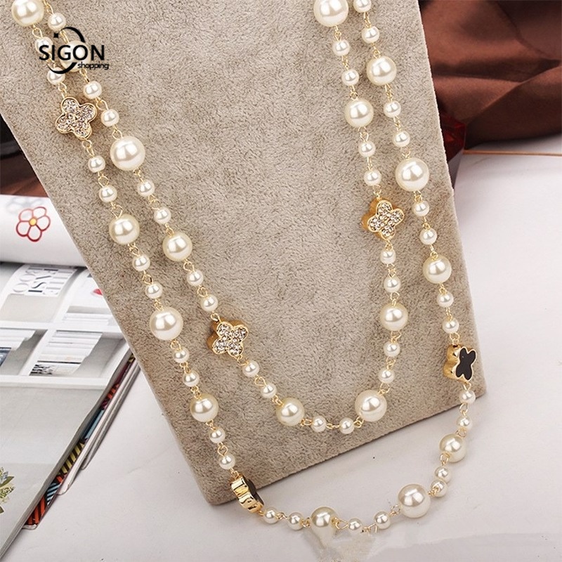 Dây chuyền chuỗi hạt ngọc trai gắn cỏ 4 lá phong cách thu đông Âu Mỹ