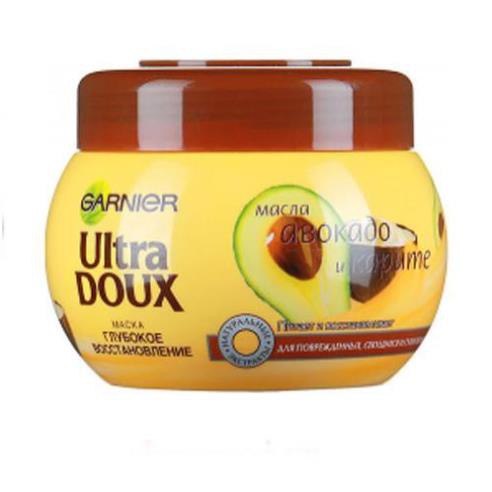 Kem ủ tóc Garnier Ultra Doux 300ml. Giúp tóc mềm mượt, phục hồi hư tổn.