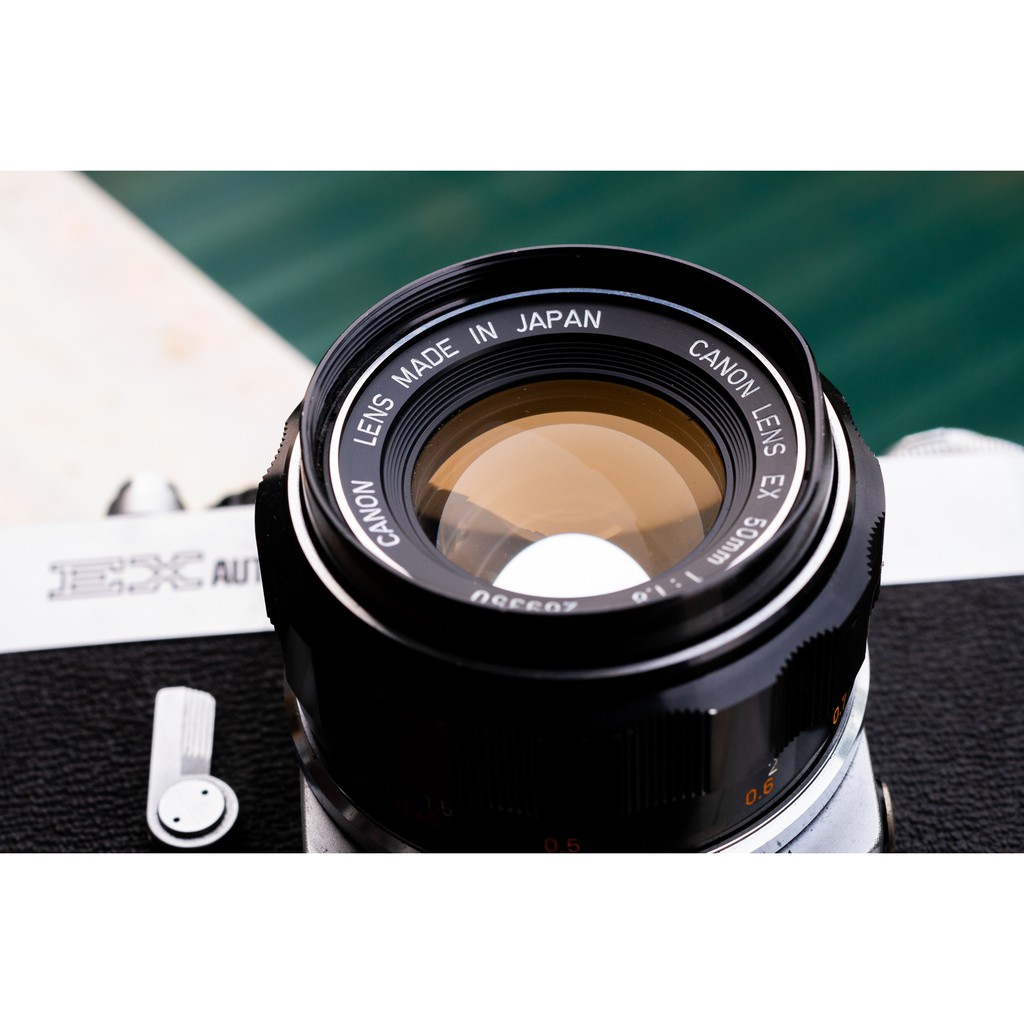 Máy ảnh cổ Canon EXAuto kèm lens 50mm f1.8 tặng kèm dây đeo hoặc filter
