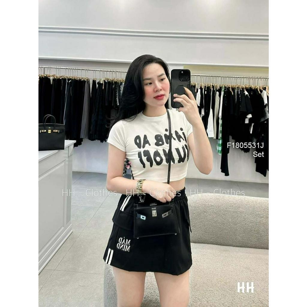 Set bộ thun thể thao áo dáng ngắn in chữ tay con kèm chân váy pha sọc trắng hai bên!