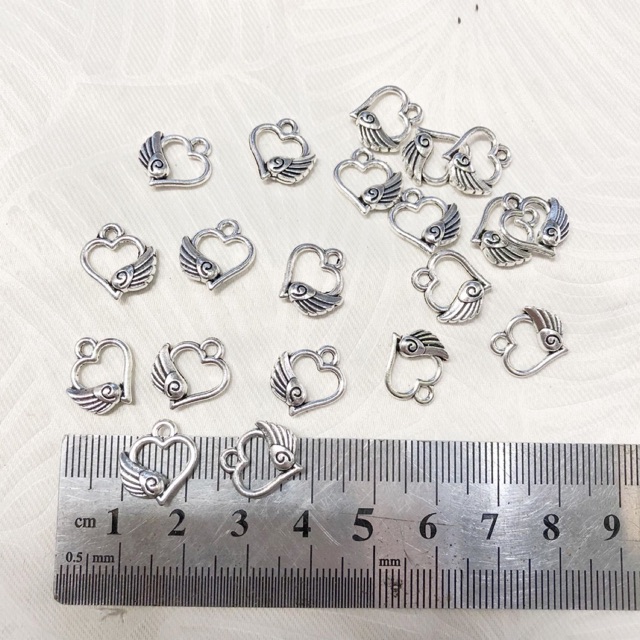 10 mặt tim rỗng xi bạc