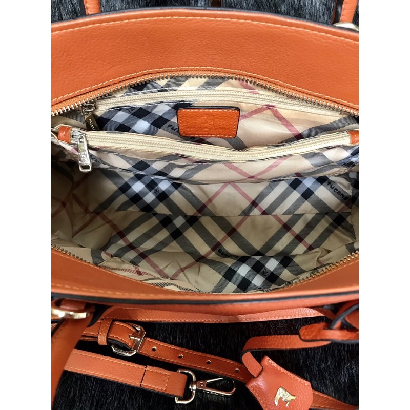 👜  Túi cầm tay, đeo chéo da thật màu cam hiệu Tucano