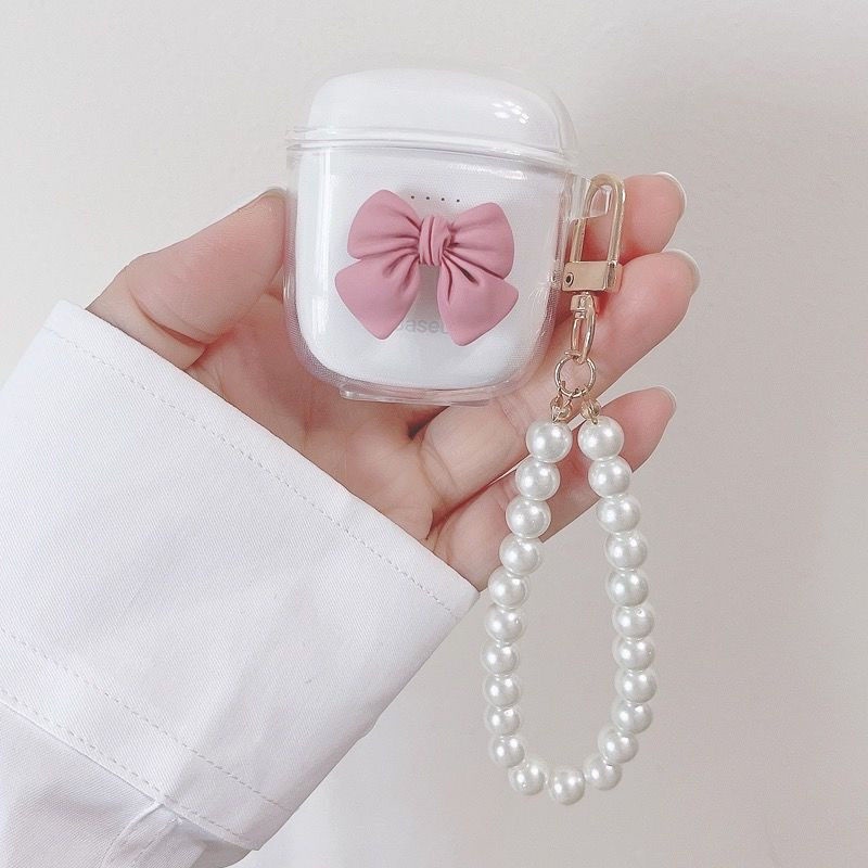 Vỏ Bọc Hộp Sạc Tai Nghe Baseus W04 Pro Mềm Đính Nơ Và Mặt Dây Chuyền Chất Lượng Cao