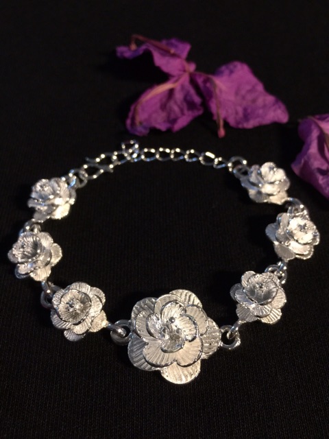 Lắc tay hoa mai bạc