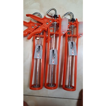 Bộ súng bắn keo silocon MCK tự ngắt và 8 đầu vòi inox đế nhựa cao cấp
