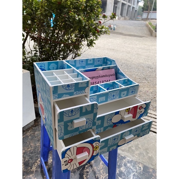 KỆ ĐỰNG MỸ PHẨM 4 HỘC DOREMON