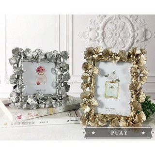 Golden silver photo frame set up Nordic wedding photography