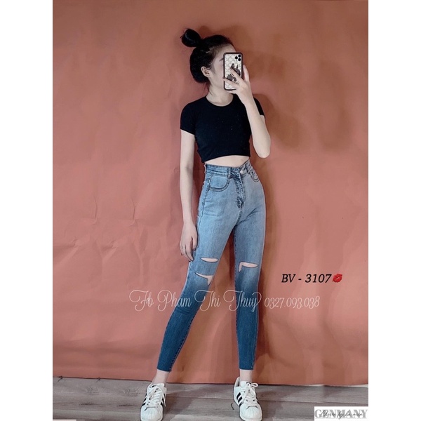 Quần jeans ôm loang rách gối