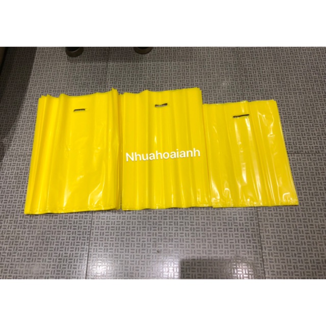 1kg Túi pe màu vàng size 35*50cm, túi đựng áo khoác mùa đông