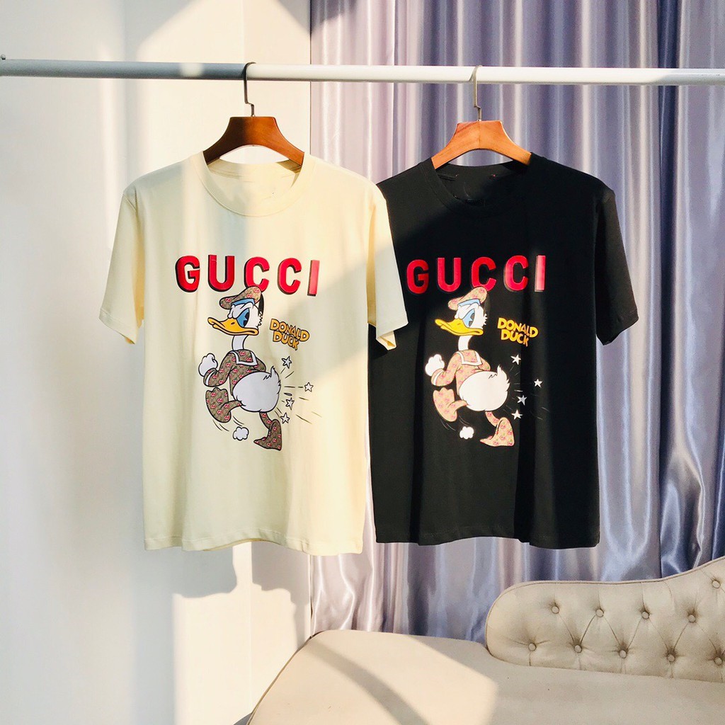 Áo Thun Gucci Cổ Tròn Tay Ngắn Dáng Rộng In Hoạ Tiết Doraemon Dành Cho Nam Và Nữ