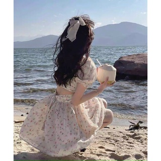 Đầm hoa nhún nơ lưng