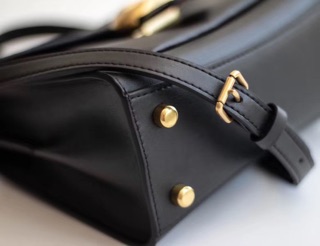 Túi Coach tabby top handle