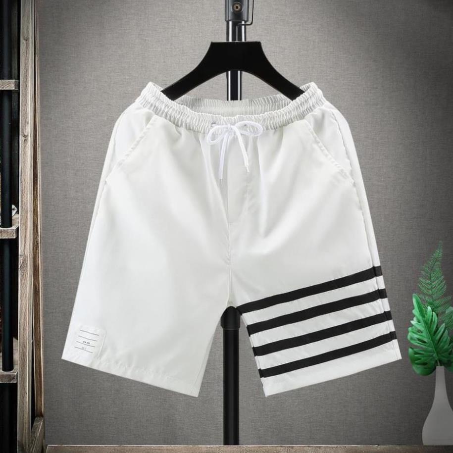 Quần đùi nam phong cách thế thao, quần ngố Thome 4 sọc thời trang nam cực chất.