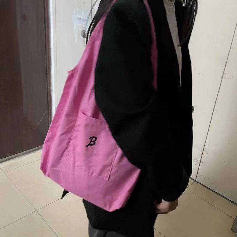 Túi đeo vai vải canvas màu vàng nhạt phong cách hè dành cho nữ