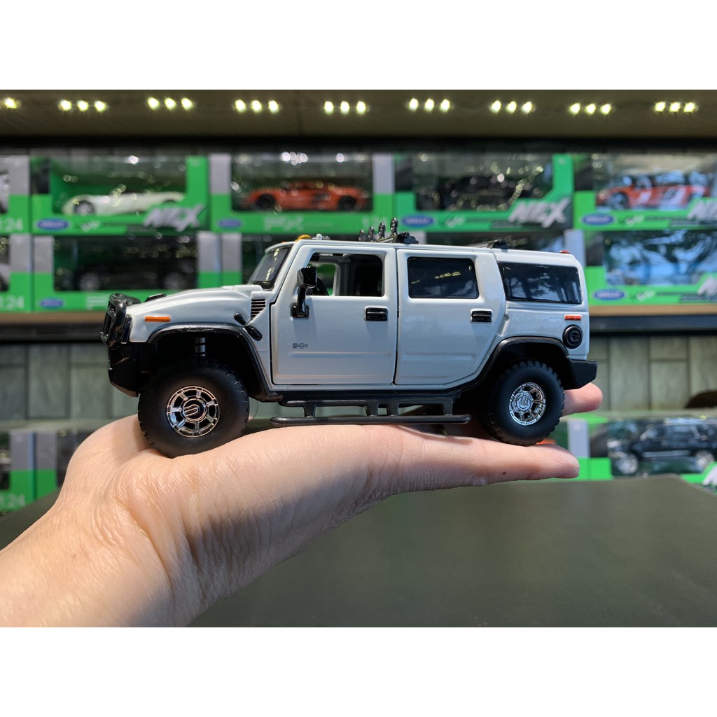 Mô hình xe Hummer H2 tỉ lệ 1:32 của hãng Jackiekim (4 Màu )