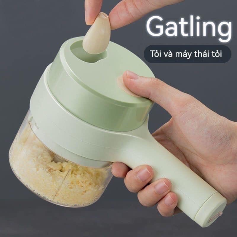 Máy say tỏi cầm tay máy thái rau củ quả.