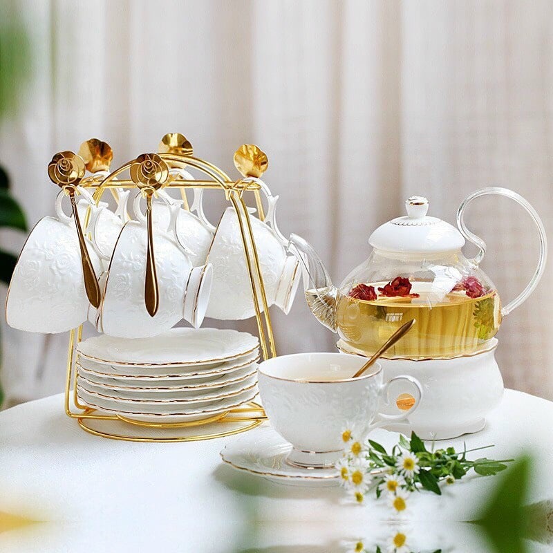 Bộ ấm chén kèm khay sứ pha trà hoa sứ xương cao cấp màu trắng viền vàng hoa hồng nổi có đế đun nến giúp trà luôn nóng