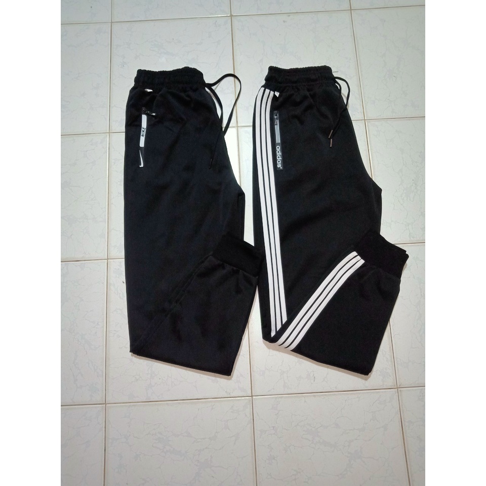 Quần thể thao Nam_Nữ có khóa kéo phối sọc UNISEX ống BO. Trẻ Trung Năng Động