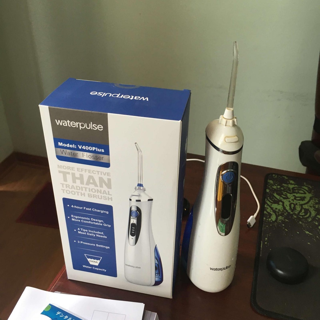 Máy Tăm Nước Cầm Tay WaterPulse V400 Plus loại bỏ những mảng bám, cao răng,