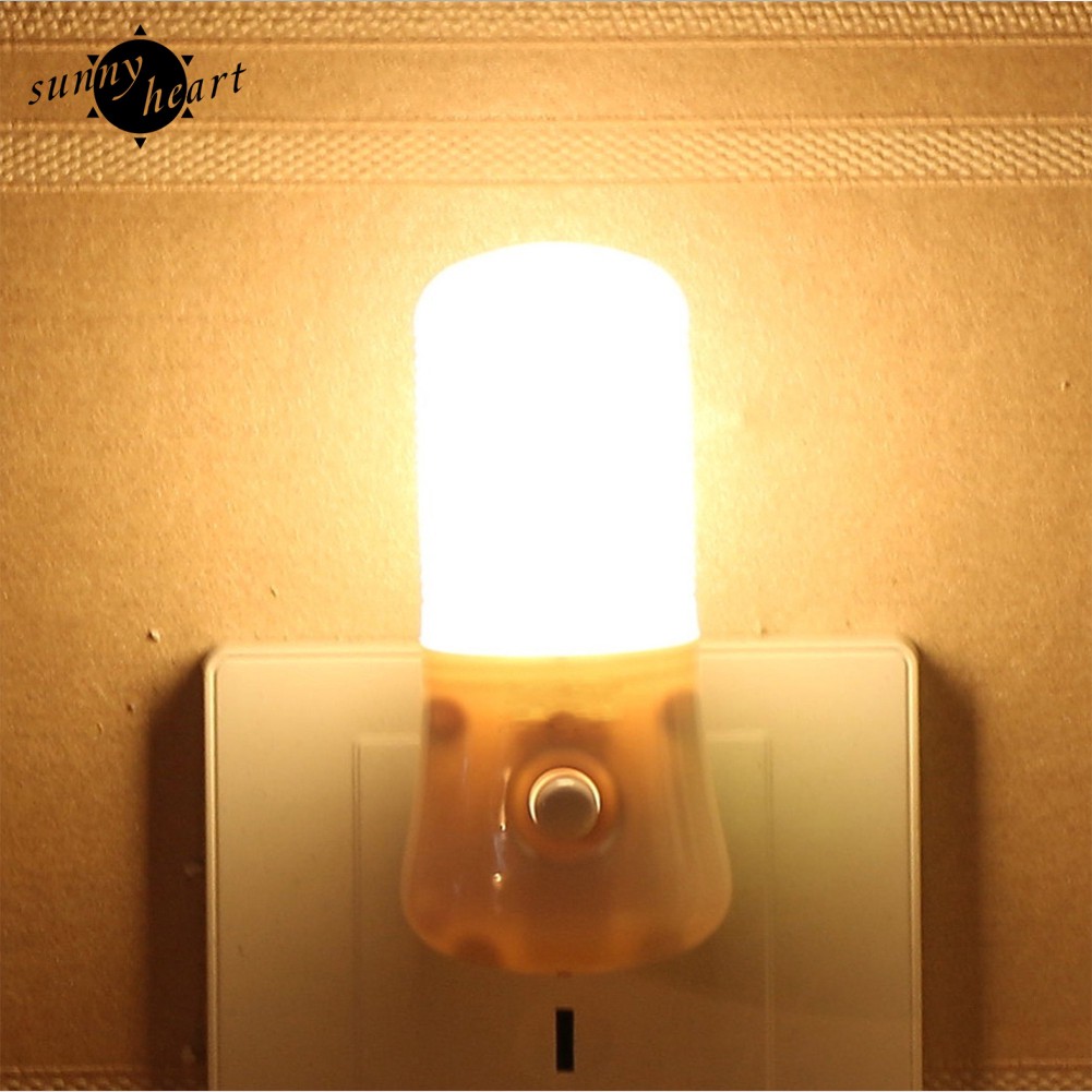 Đèn ngủ led màu trắng ấm 3W đặt cạnh giường ngủ