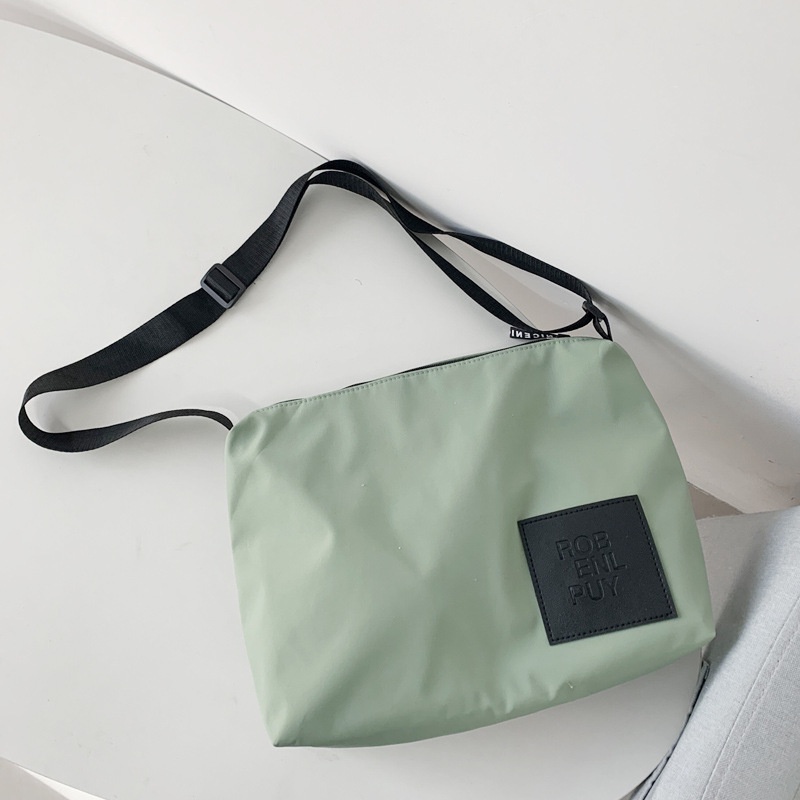 Túi đeo vai bằng vải canvas nylon chống nước sức chứa lớn phong cách Hong Kong đơn giản cho nam và nữ