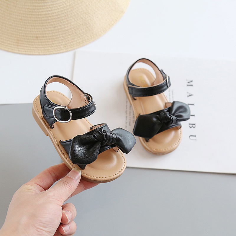 Xăng đan Da Mềm Đính Nơ Chống Trượt Màu Trơn Đơn Giản Dành Cho Bé Gái 1-8 Tuổi