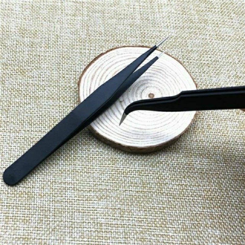 Nhíp gắp đá và hình dán móng