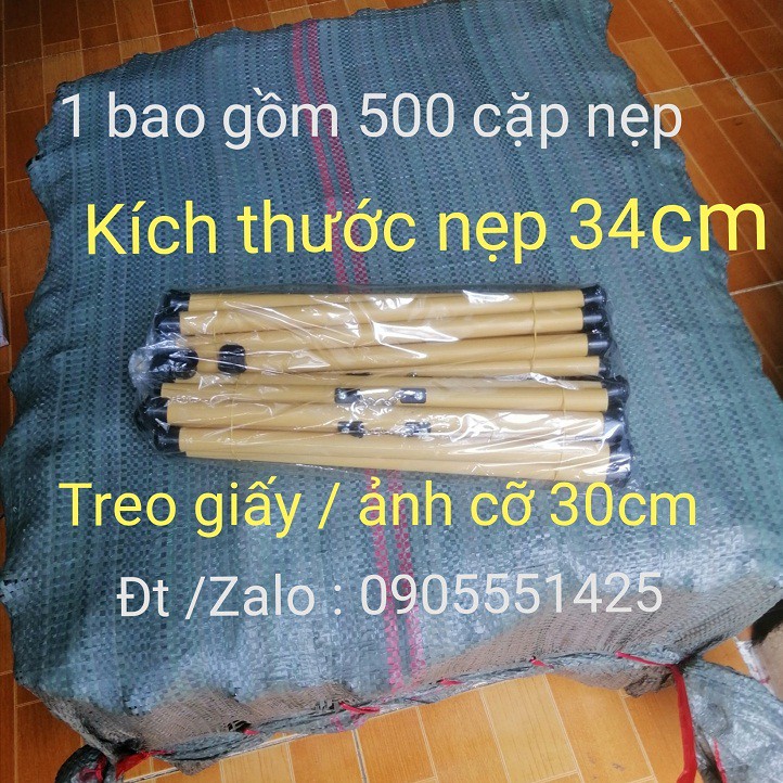 1  BAO ống trúc( nẹp) treo ảnh.Ống trúc(nẹp) treo giấy viết thư pháp.Ống trúc( nẹp) treo lịch, tranh, giấy a3. Dài 34cm