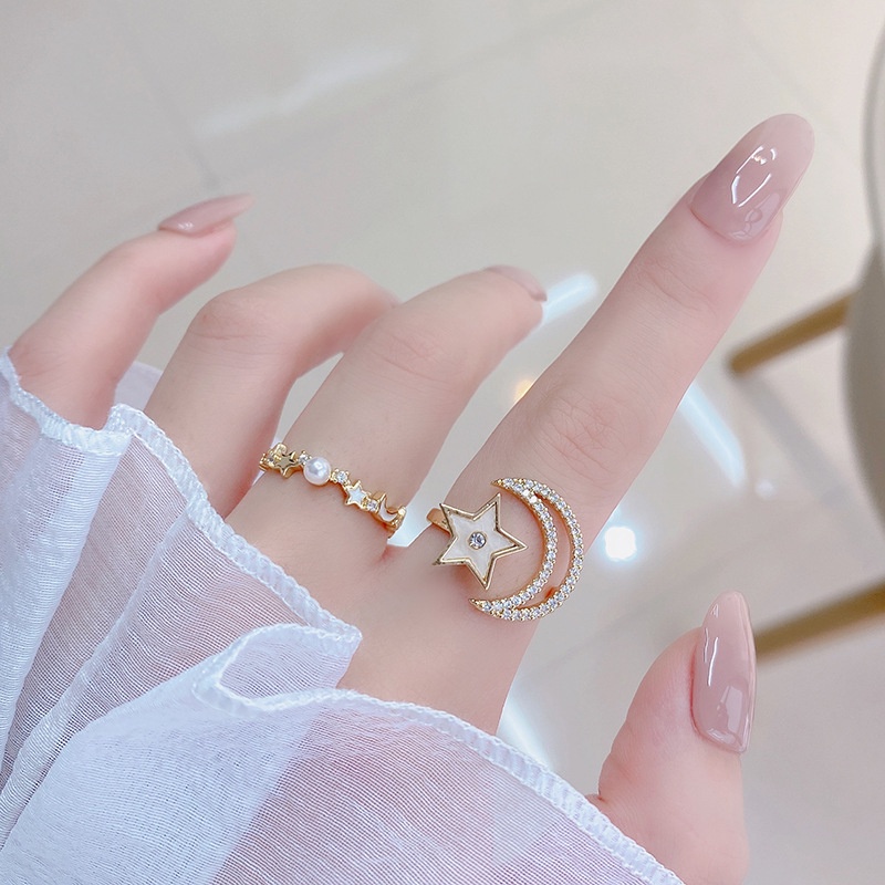 Nhẫn hở hình trăng sao đính ngọc trai xoay được phong cách Hàn Quốc