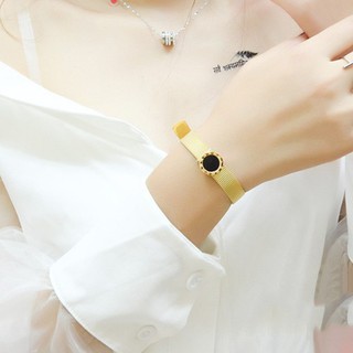 Lắc tay nữ mặt tròn titan ko đen tt 2817