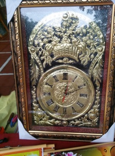 Tranh đồng hồ bằng đồng