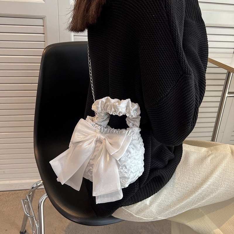 Túi đeo chéo đính nơ vải sần Butterfly